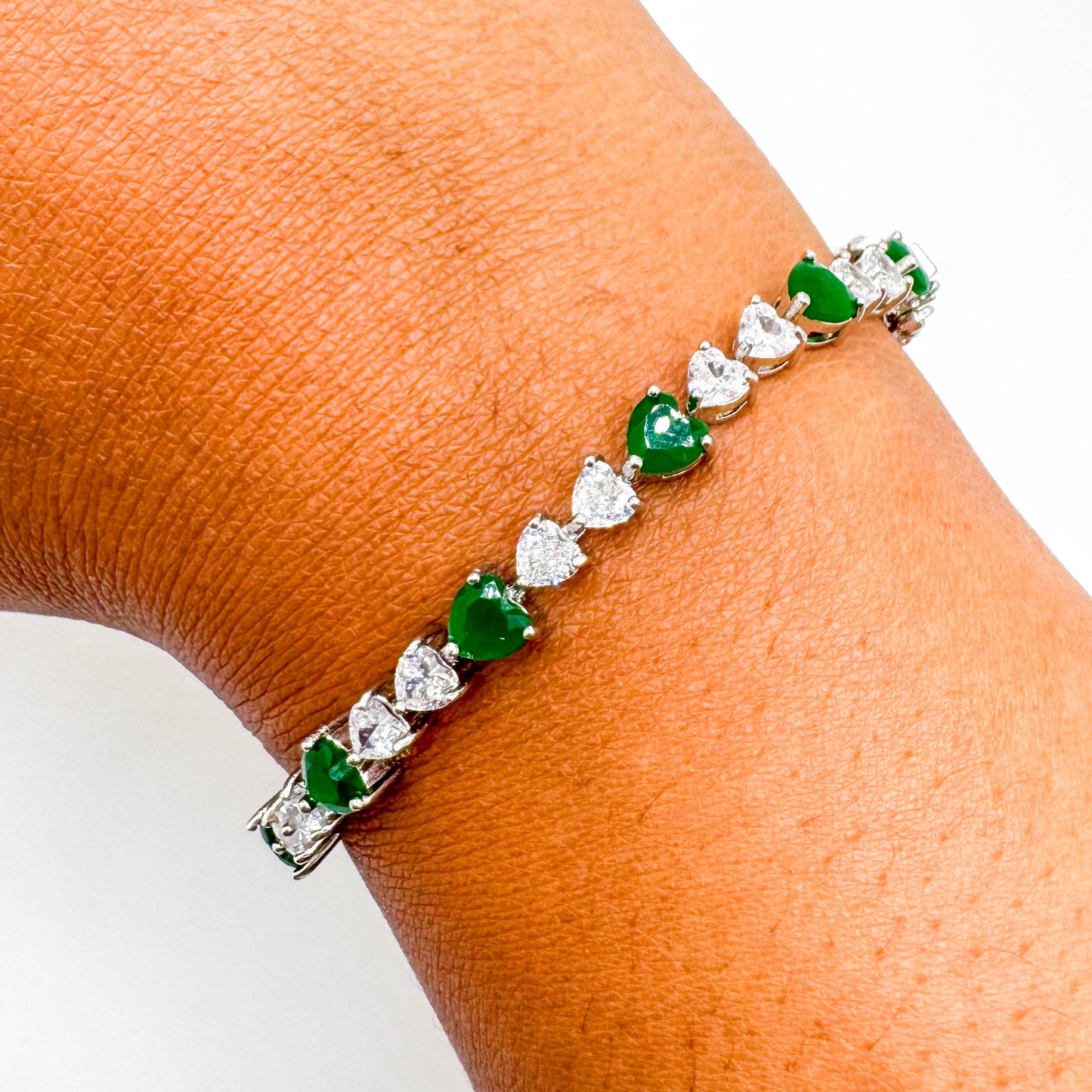 RHODIUM PLATED EMERALD HEARTS BRACELET
