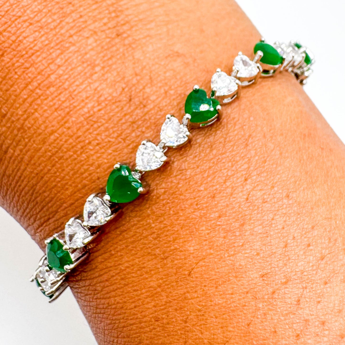 RHODIUM PLATED EMERALD HEARTS BRACELET