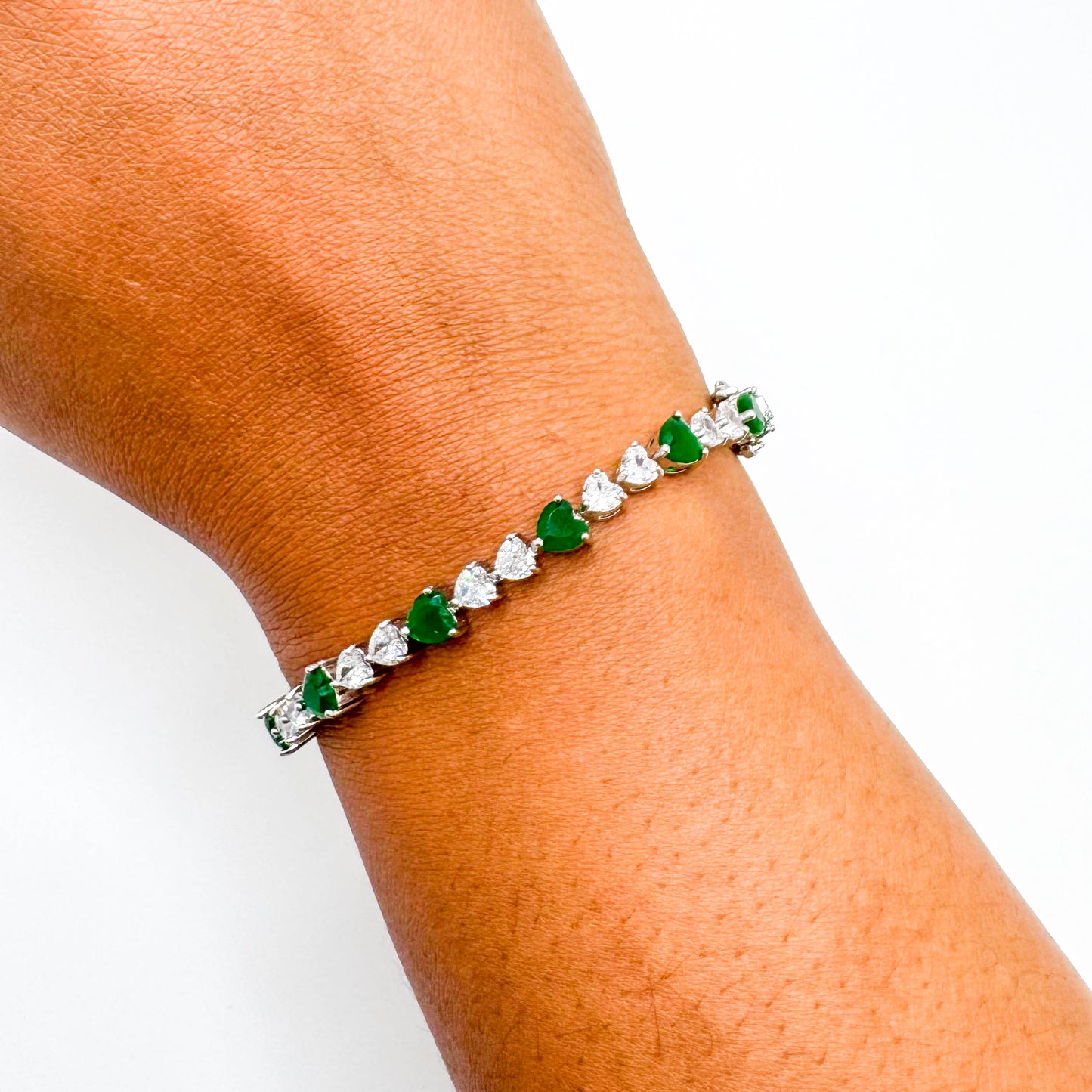 RHODIUM PLATED EMERALD HEARTS BRACELET