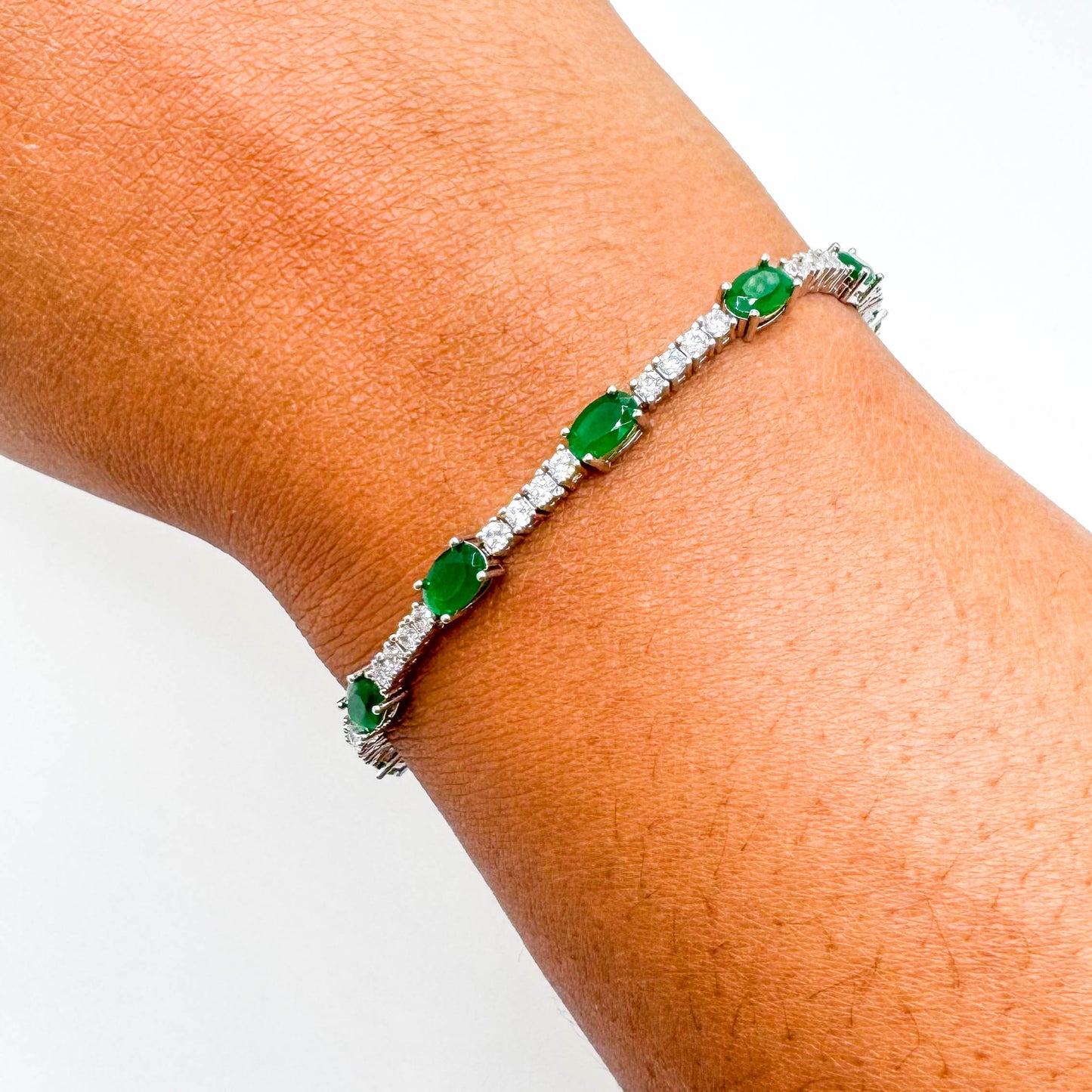 RHODIUM PLATED OVAL DIAMOND EMERALD BRACELET