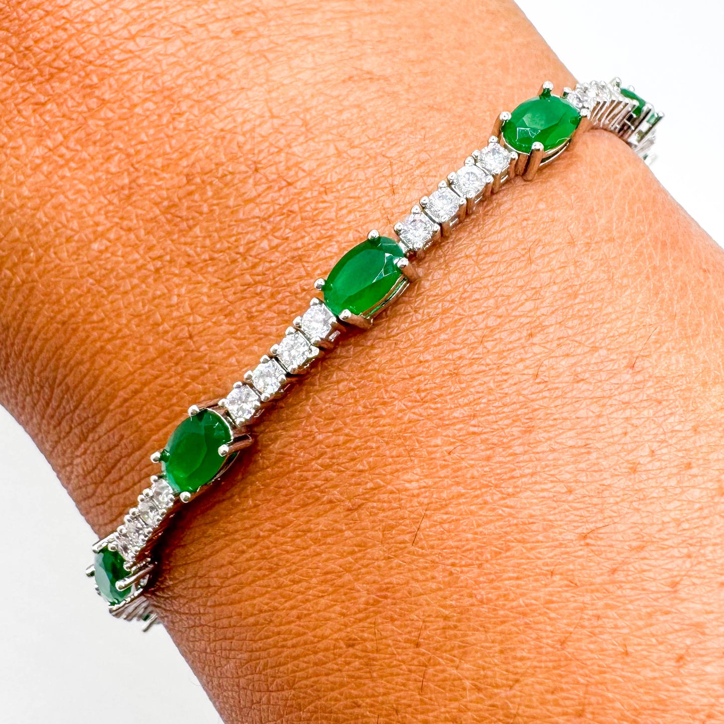 RHODIUM PLATED OVAL DIAMOND EMERALD BRACELET