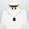 White rhodium plated set with green zirconia